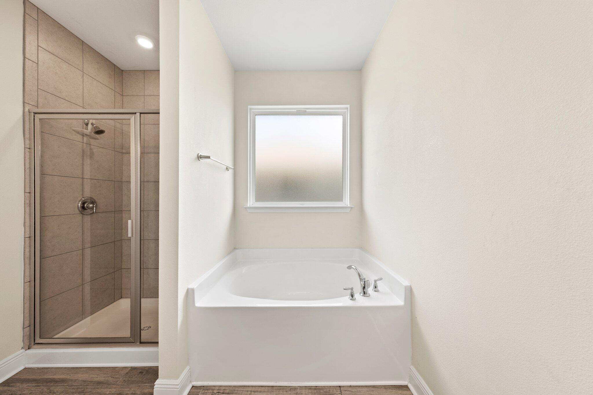 91 Sweet Tea Lane Freeport, FL 32439 - Photo 50 of 80 a bathroom with a bathtub