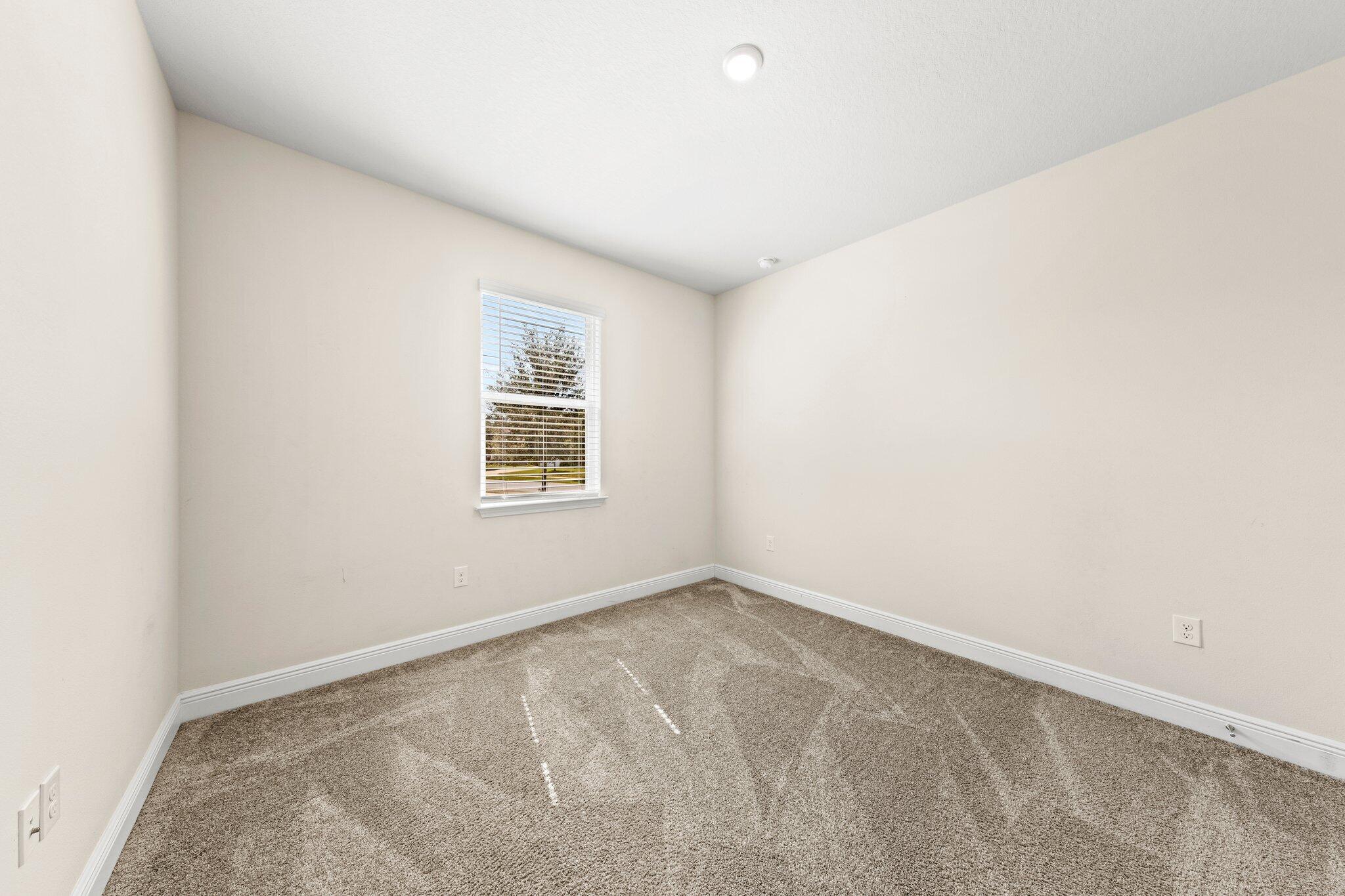 91 Sweet Tea Lane Freeport, FL 32439 - Photo 57 of 80 an empty room with a window