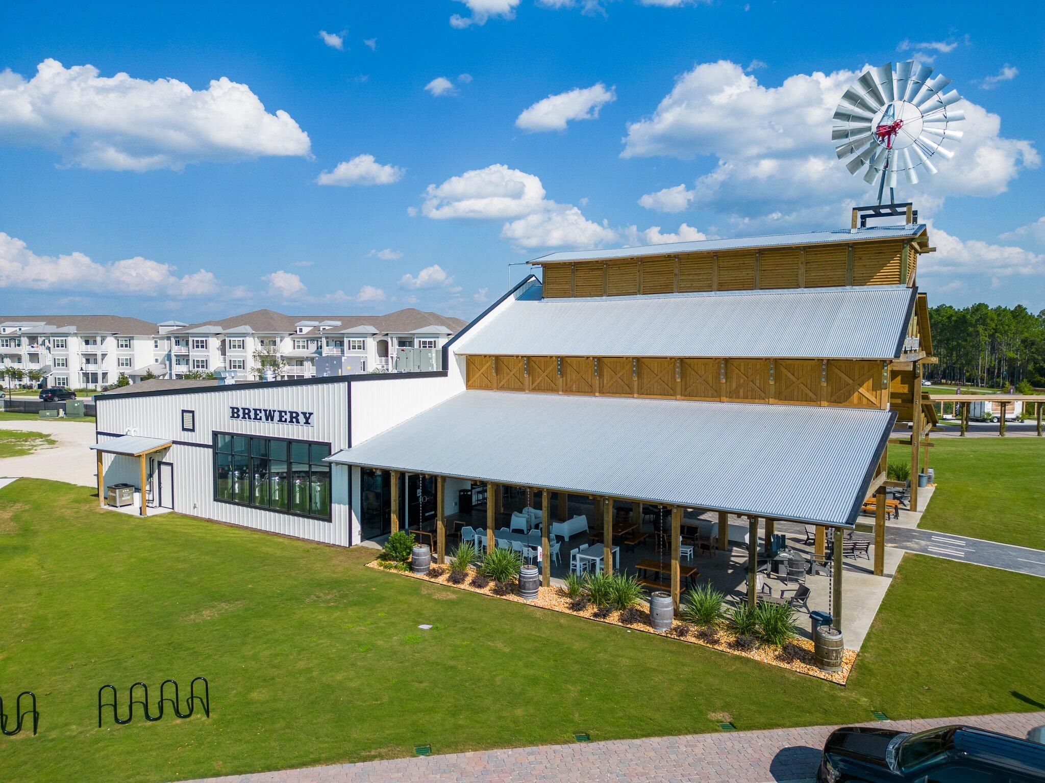 91 Sweet Tea Lane Freeport, FL 32439 - Photo 80 of 80 a front view of a house with a yard