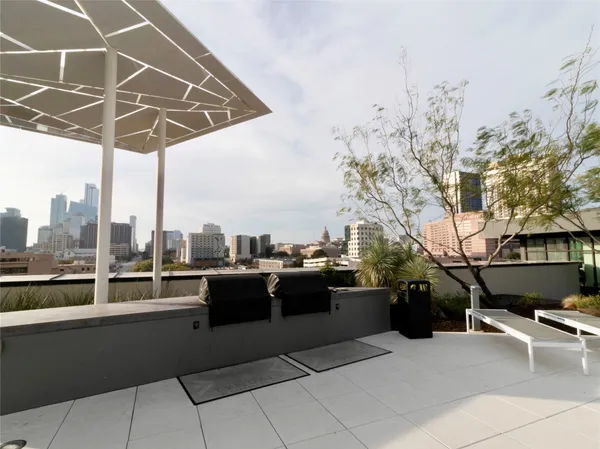 a view of roof deck with seating space