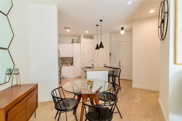 a living room with furniture fireplace and flat screen tv