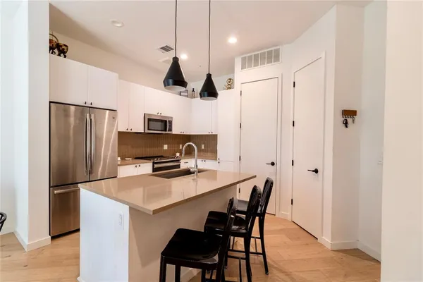 a view of a dining room with furniture