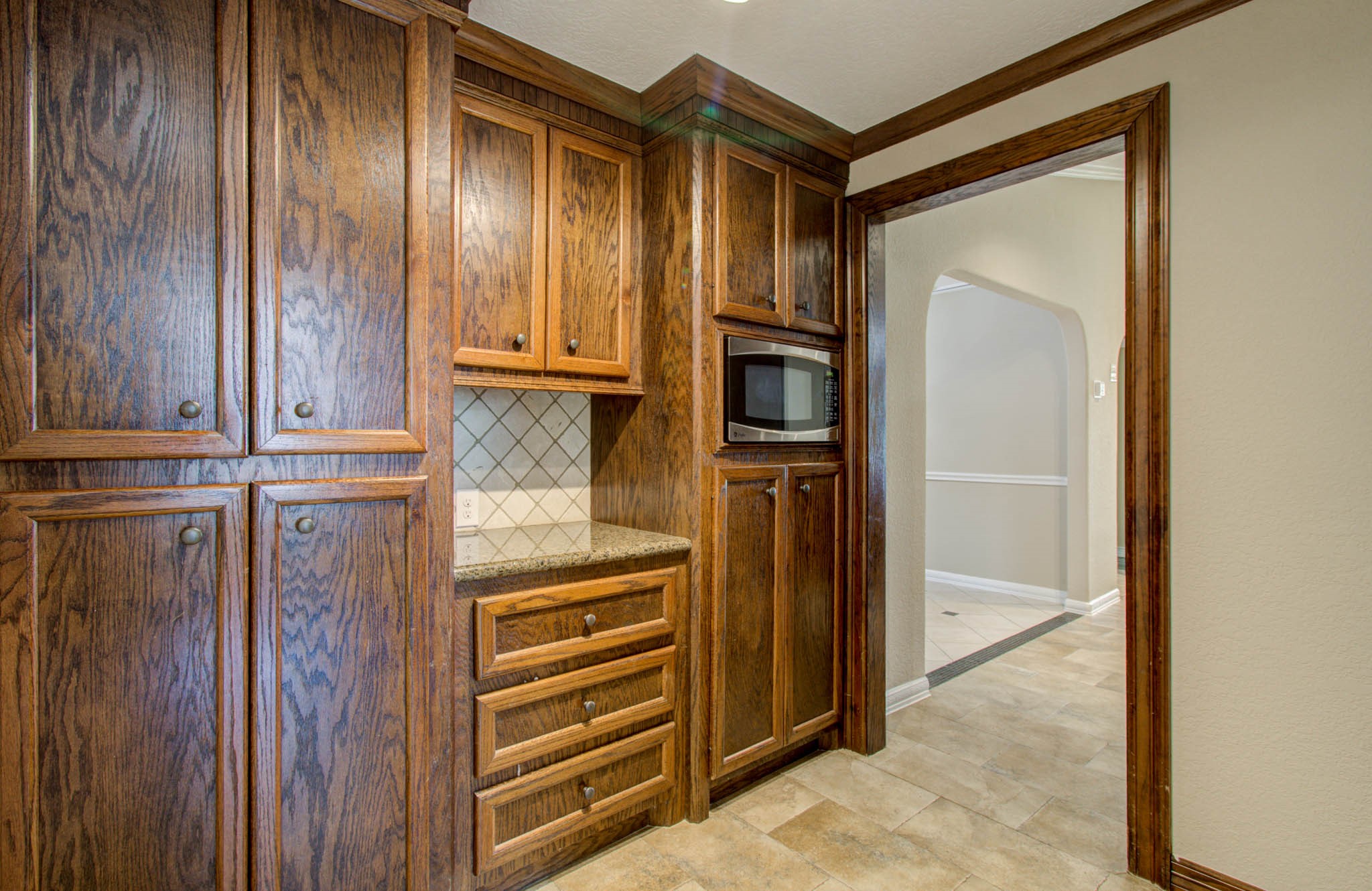 8942 Judwin Street Houston, TX 77075 - Photo 12 of 21 a view of front door with hallway