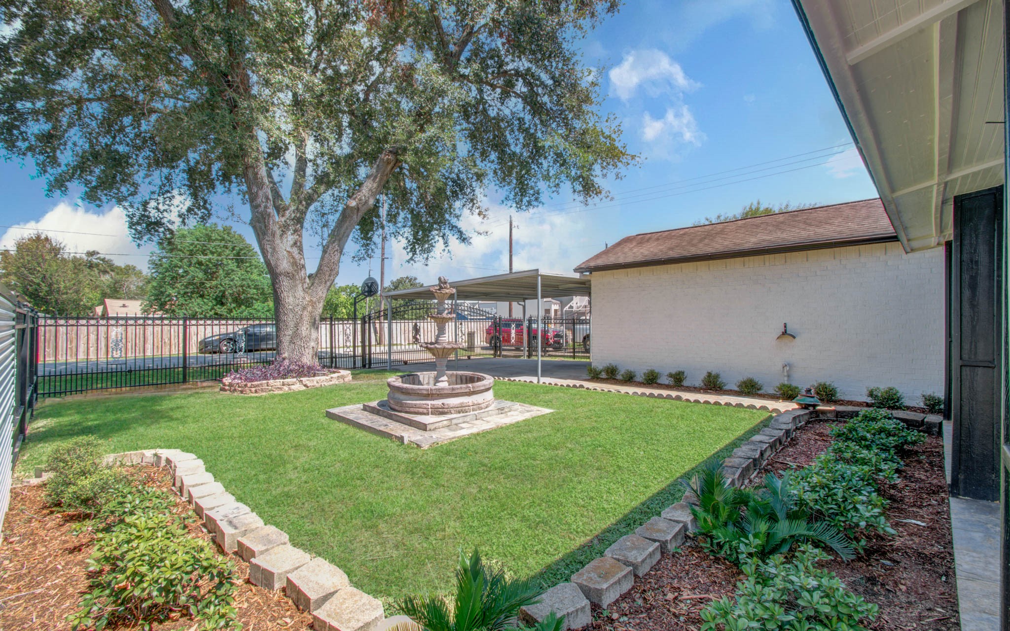 8942 Judwin Street Houston, TX 77075 - Photo 3 of 21 a couple of table and chairs in the garden