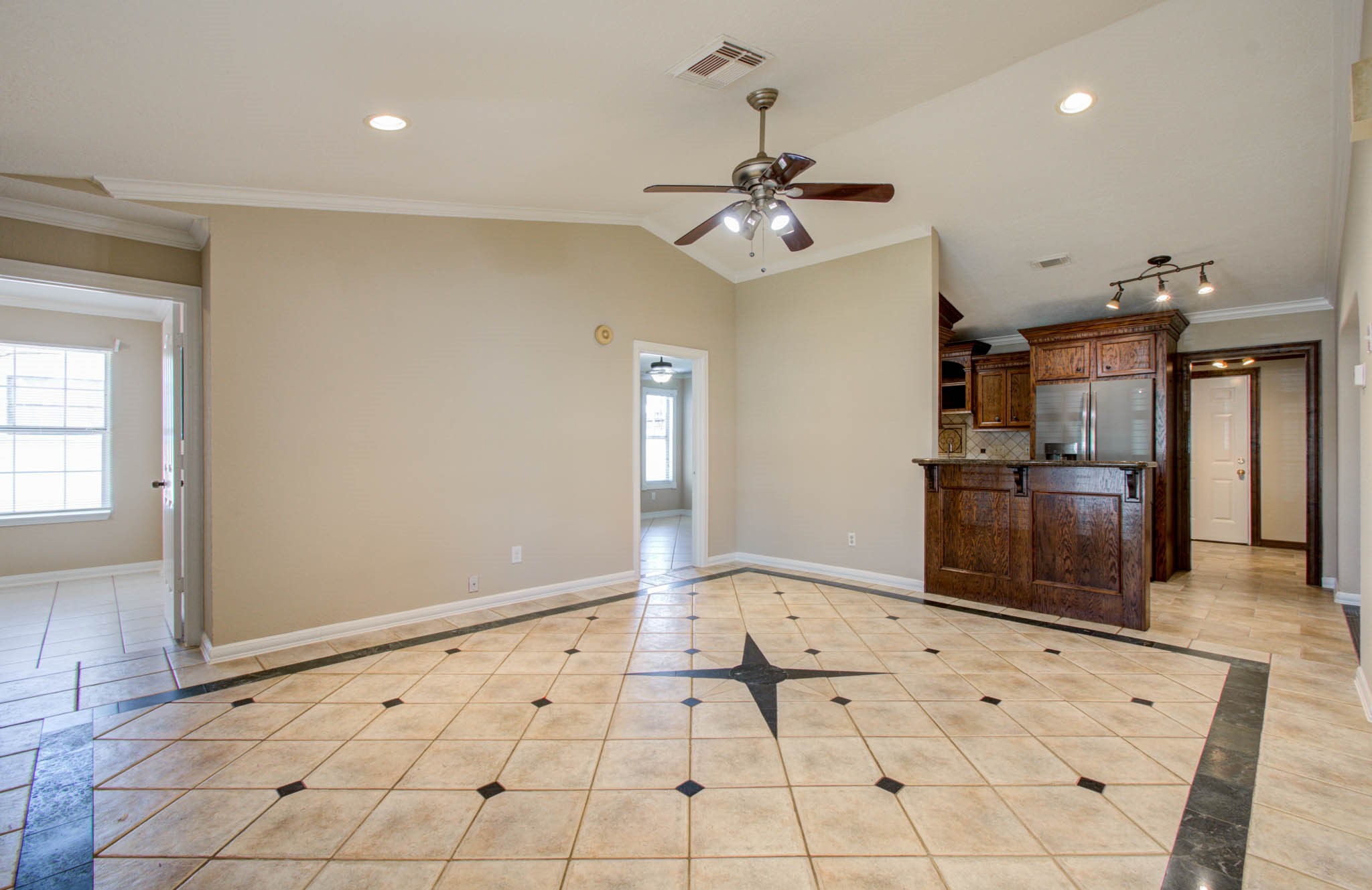 8942 Judwin Street Houston, TX 77075 - Photo 5 of 21 a view of an entryway with a chandelier