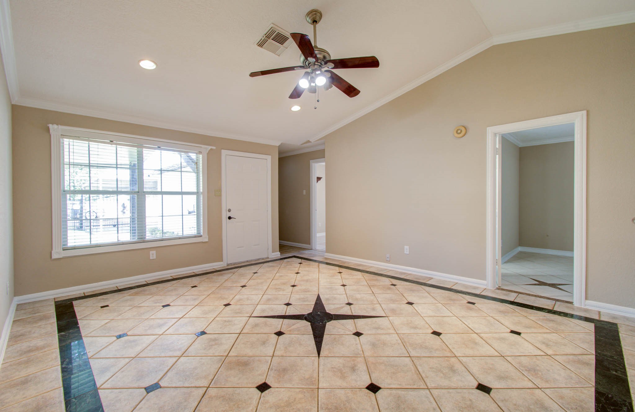 8942 Judwin Street Houston, TX 77075 - Photo 6 of 21 a view of an empty room and window