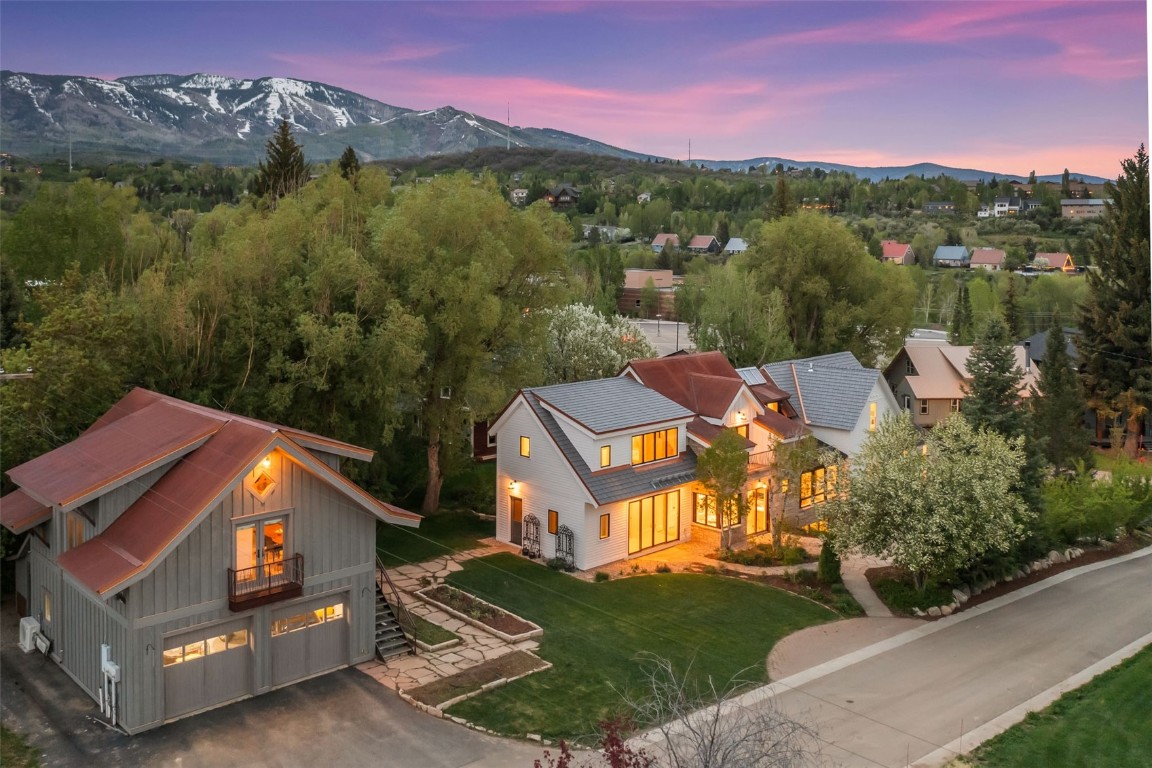 24 Maple Street Steamboat Springs, CO 80487 - Photo 2 of 49 an aerial view of a house with a yard