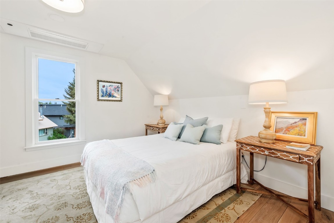 24 Maple Street Steamboat Springs, CO 80487 - Photo 31 of 49 a bedroom with a bed and a window