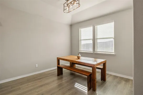 a room with table and window