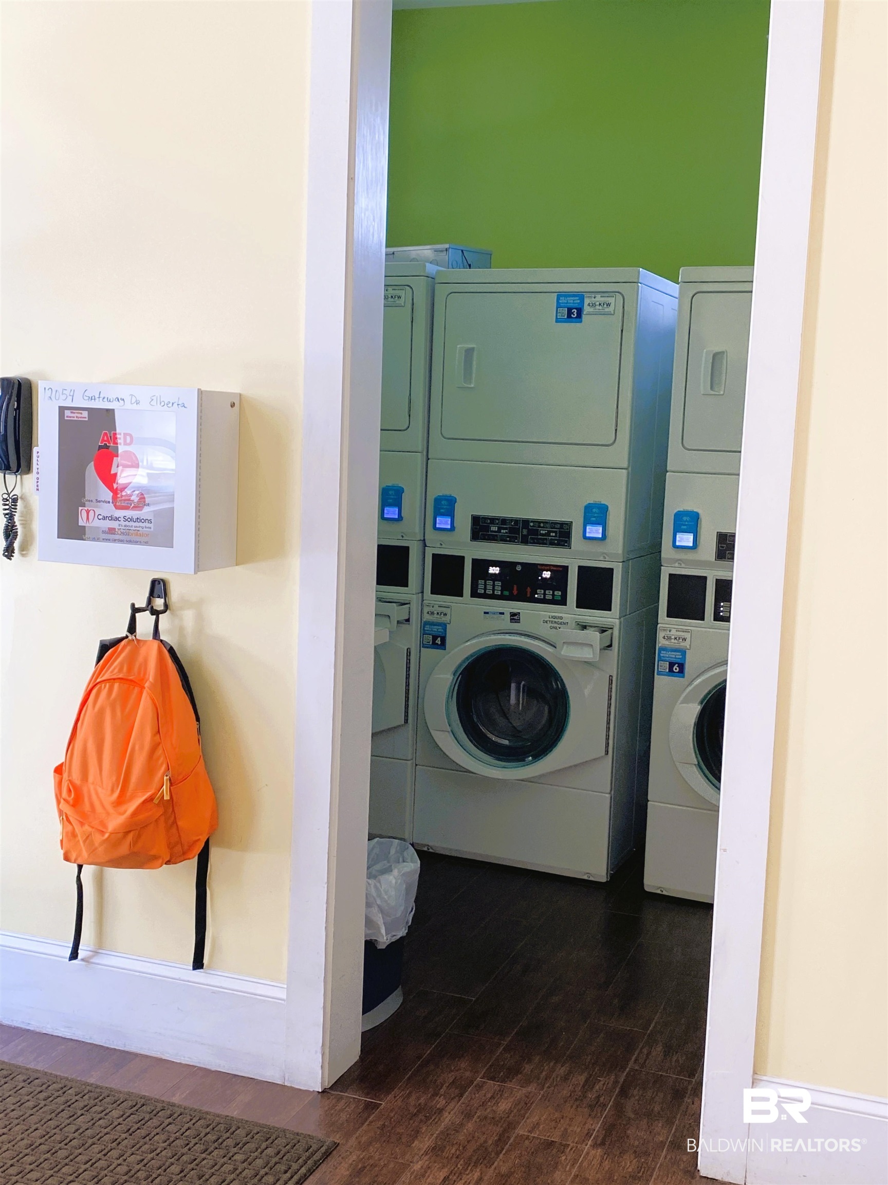 12377 Gateway Drive Elberta, AL 36530 - Photo 50 of 64 Community laundry with stacked washer and dryer