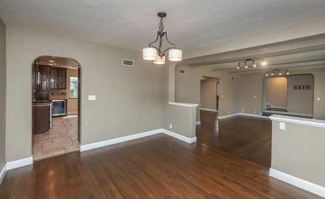 a view of a kitchen with a sink