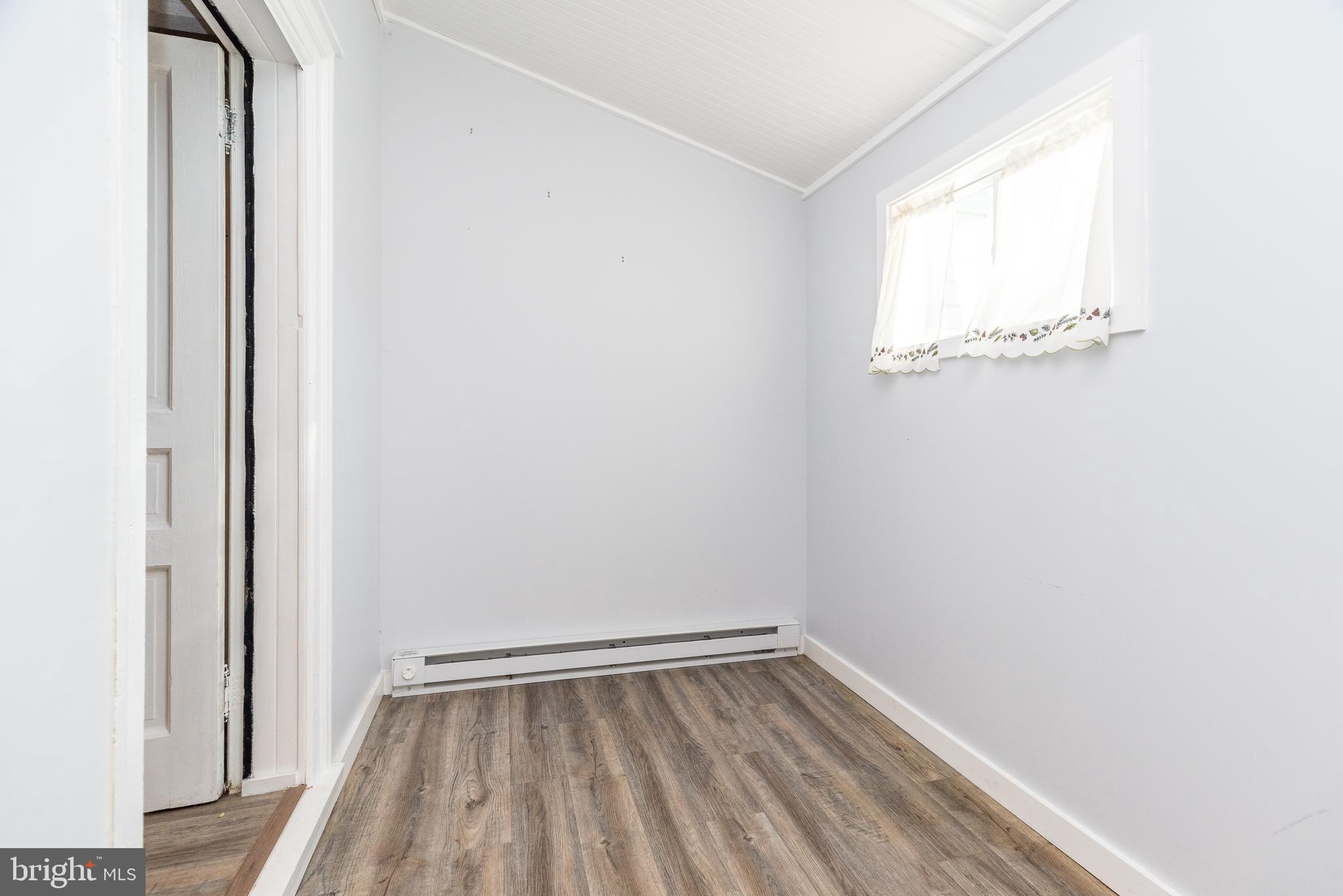 4924 Ridge Avenue Feasterville-Trevose, PA 19053 - Photo 14 of 38 a view of a small space with wooden floor and a window