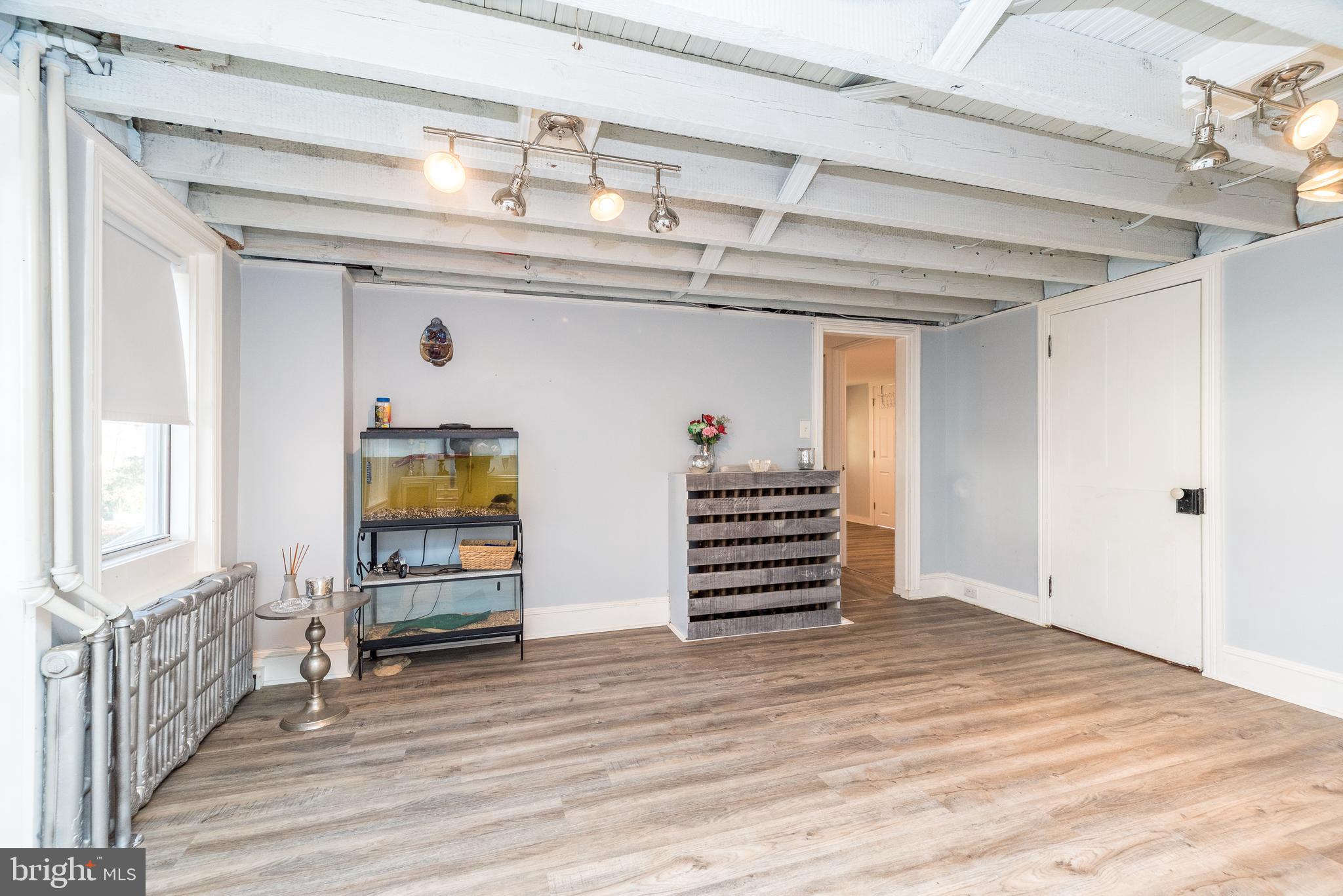 4924 Ridge Avenue Feasterville-Trevose, PA 19053 - Photo 16 of 38 a view of room with stairs and wooden floor