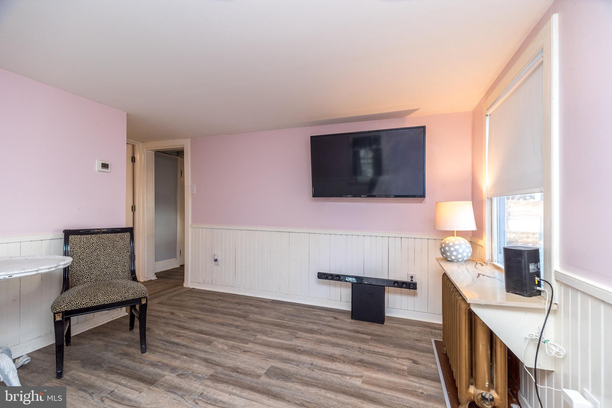 4924 Ridge Avenue Feasterville-Trevose, PA 19053 - Photo 17 of 38 a view of a livingroom with furniture and wooden floor