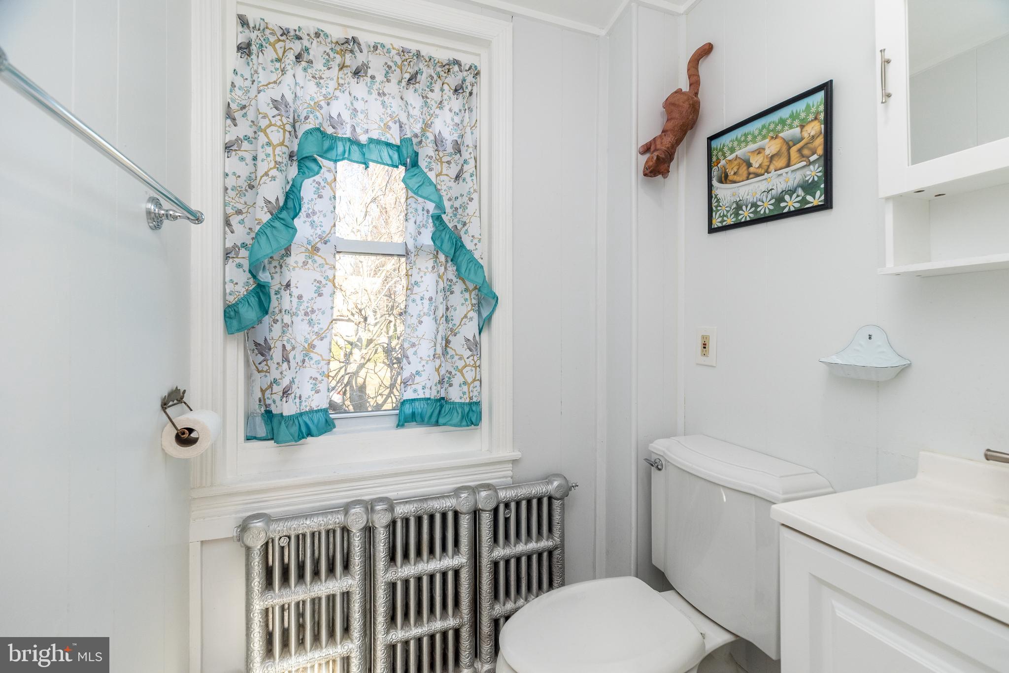 4924 Ridge Avenue Feasterville-Trevose, PA 19053 - Photo 24 of 38 a bathroom with a toilet and a window