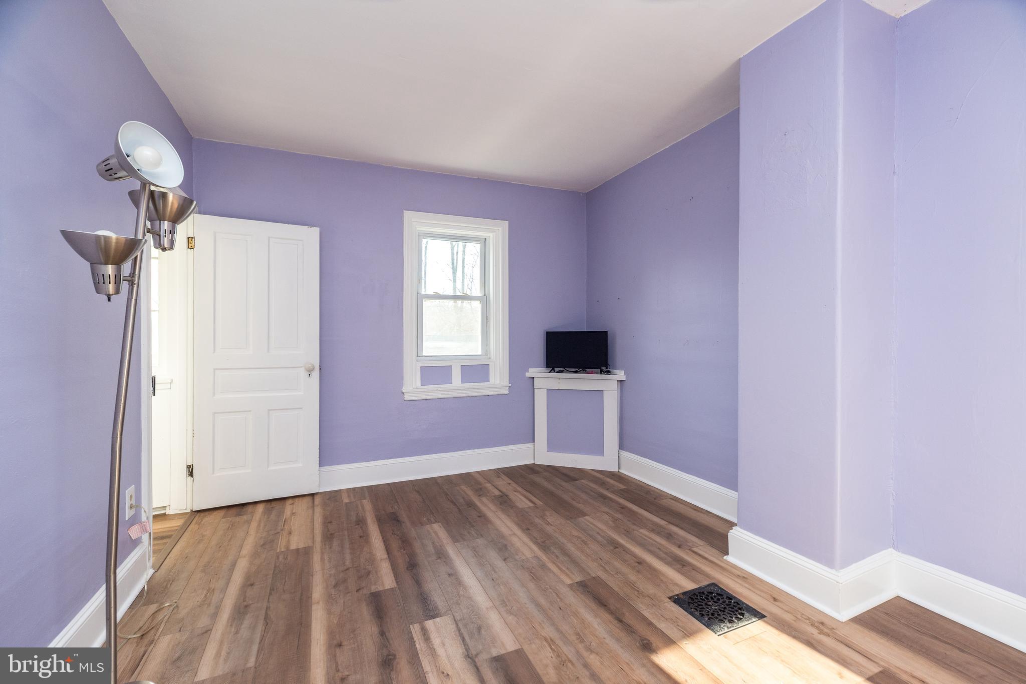 4924 Ridge Avenue Feasterville-Trevose, PA 19053 - Photo 27 of 38 a view of a livingroom with wooden floor and a window