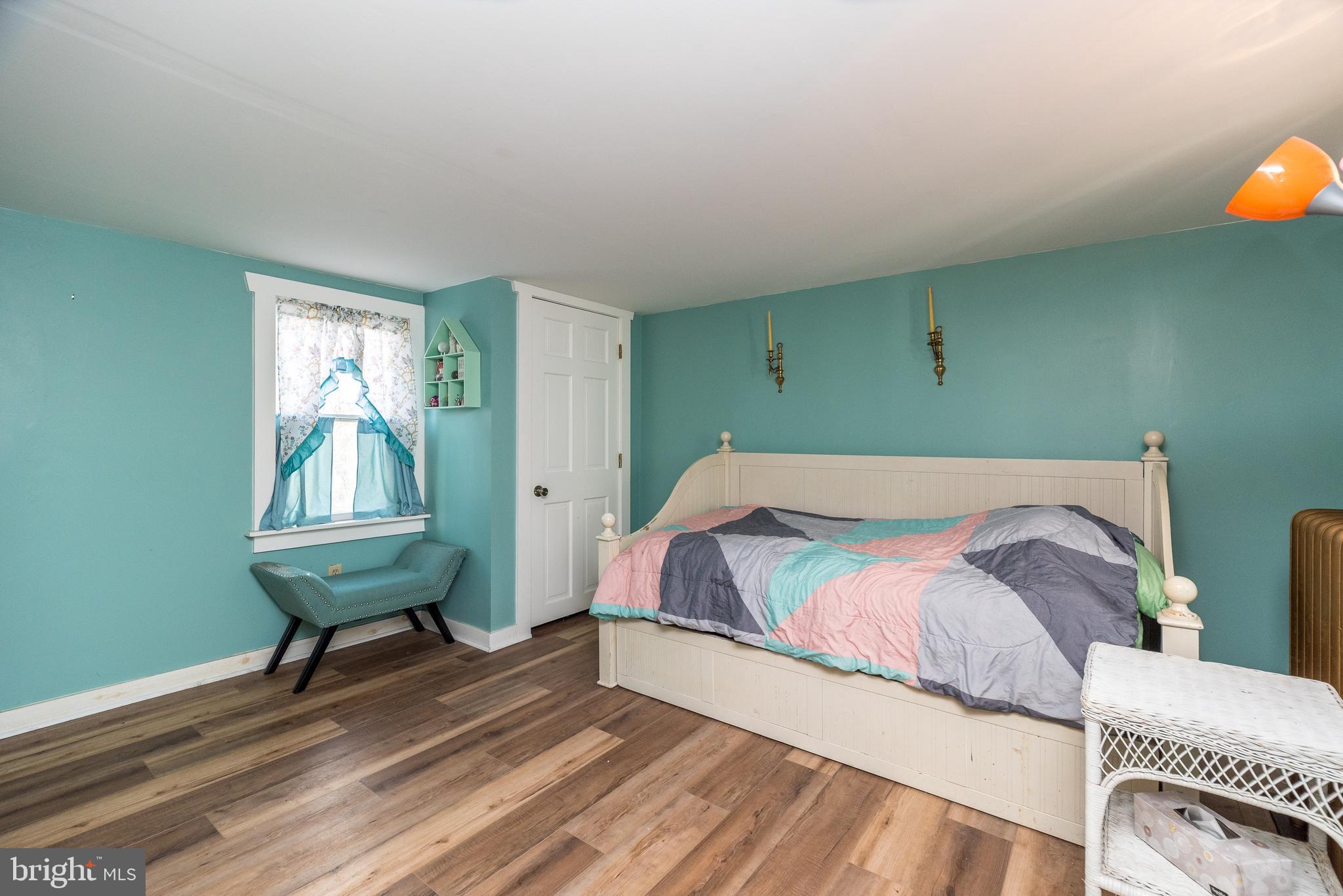 4924 Ridge Avenue Feasterville-Trevose, PA 19053 - Photo 30 of 38 a bedroom with a bed and windows