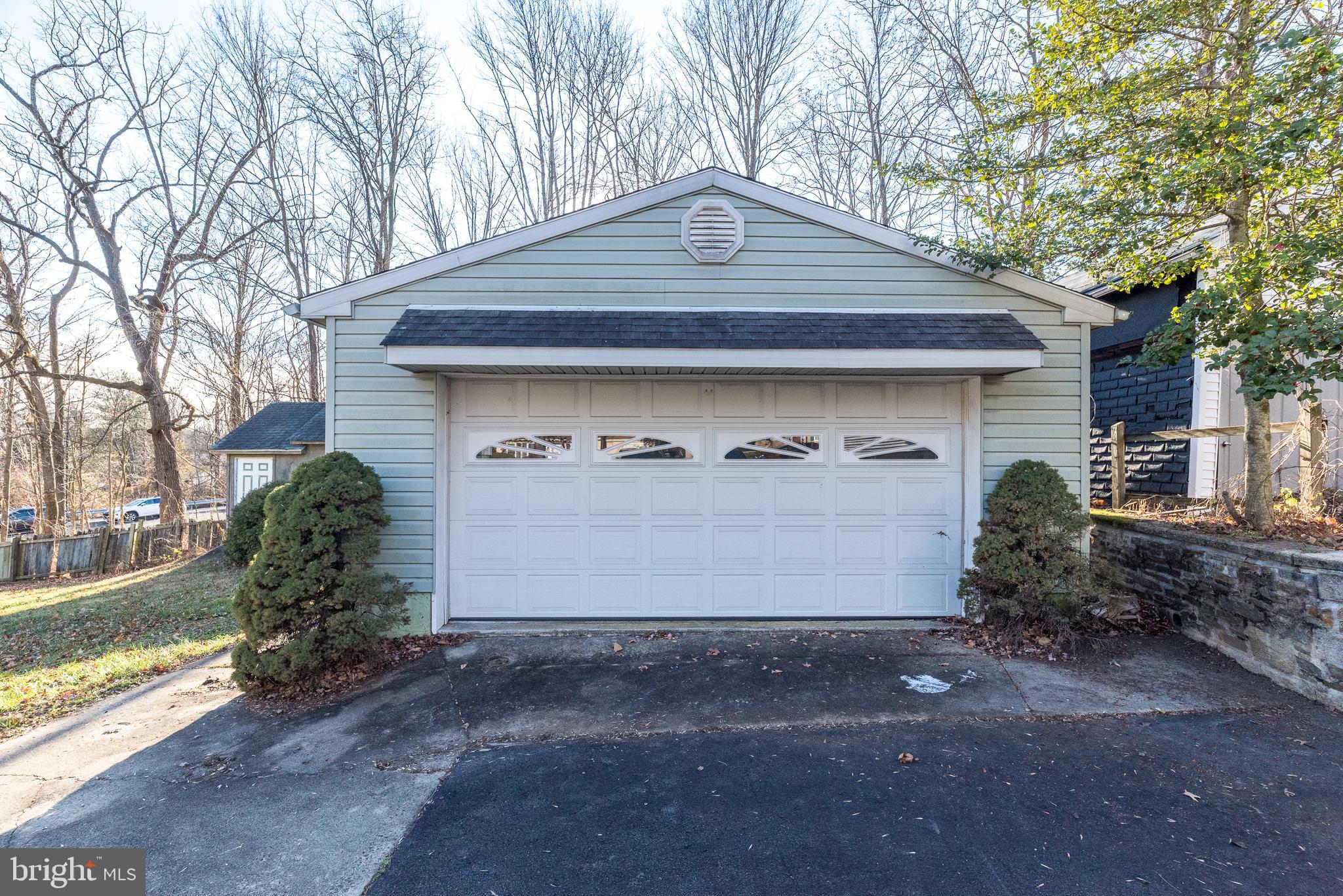 4924 Ridge Avenue Feasterville-Trevose, PA 19053 - Photo 37 of 38 a front view of a house with garden