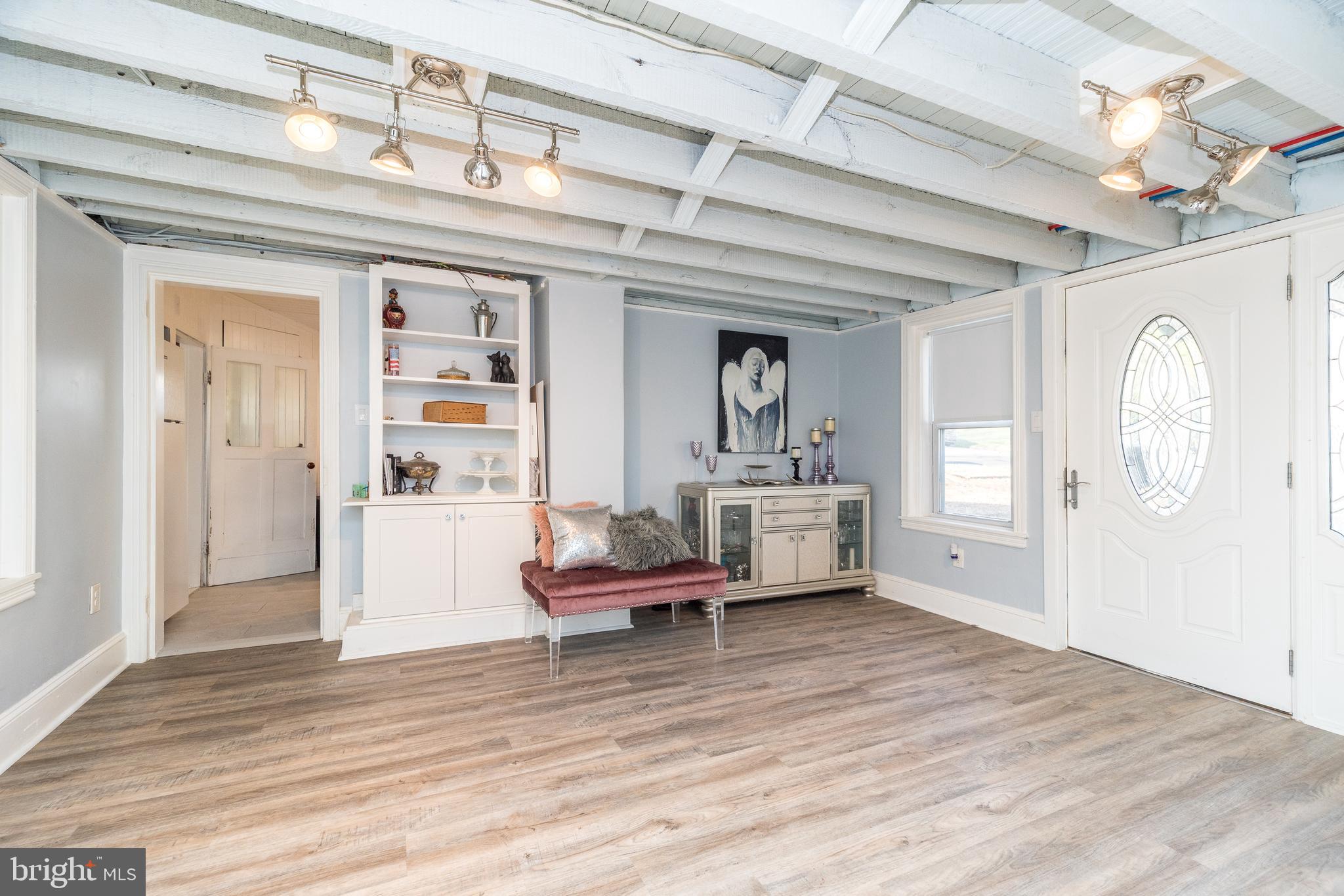 4924 Ridge Avenue Feasterville-Trevose, PA 19053 - Photo 6 of 38 a living room with furniture and a wooden floor