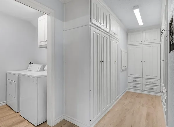 a view of a hallway with closet