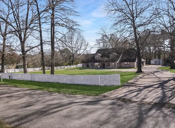 a view of park with tree s