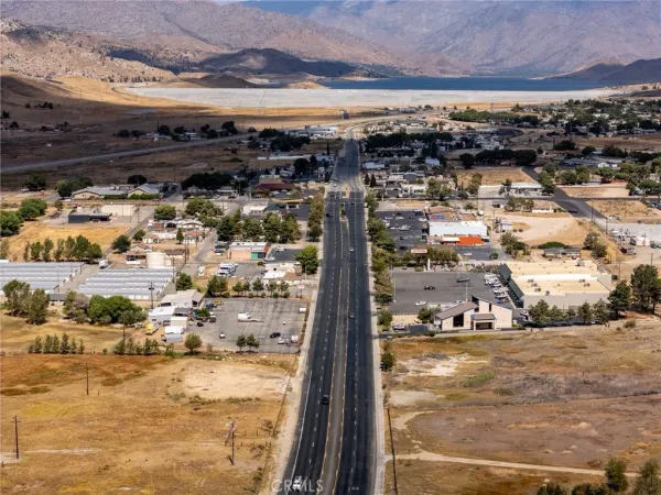 a view of a large body of water with a mountain in the background
