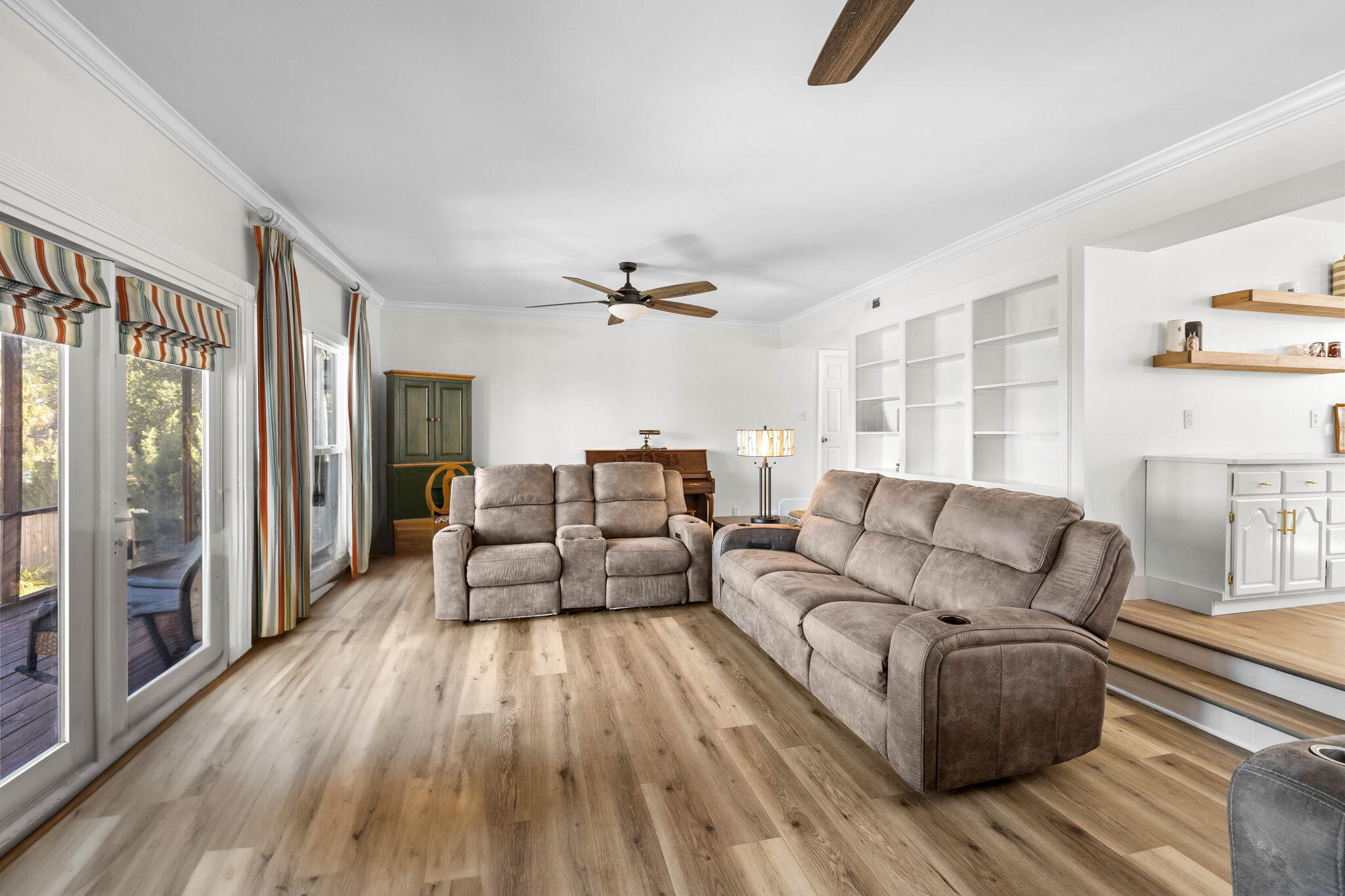 710 Beach Drive Destin, FL 32541 - Photo 19 of 64 a living room with furniture and a wooden floor