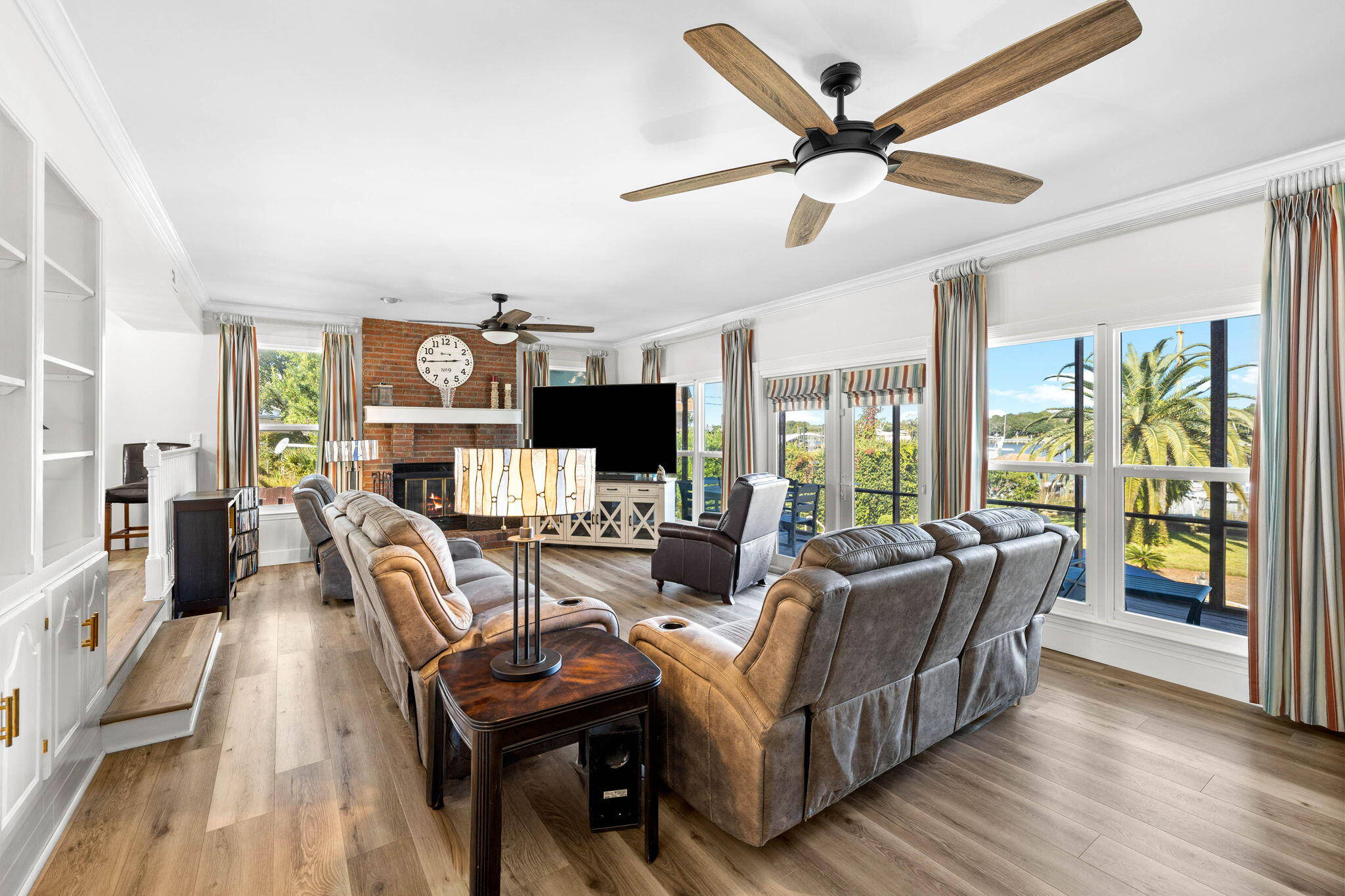710 Beach Drive Destin, FL 32541 - Photo 21 of 64 a living room with furniture and a flat screen tv