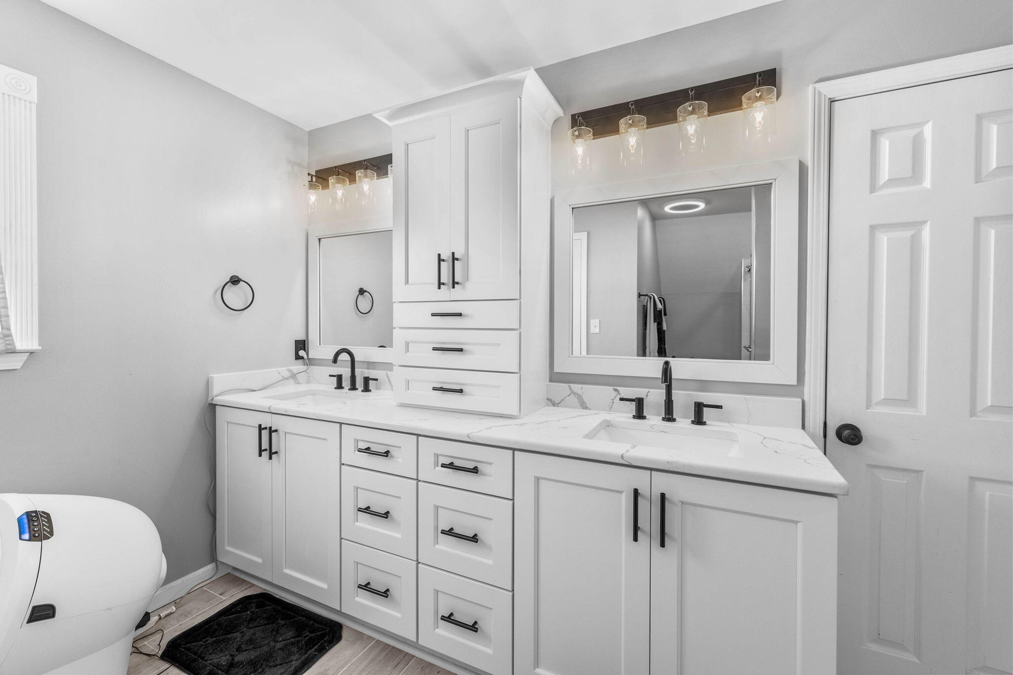 710 Beach Drive Destin, FL 32541 - Photo 30 of 64 a bathroom with a double vanity sink and mirror with toilet