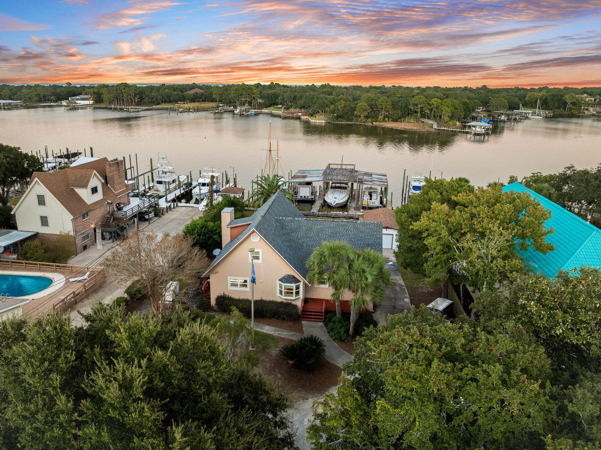 710 Beach Drive Destin, FL 32541 - Photo 3 of 64 a view of a lake with houses in the back