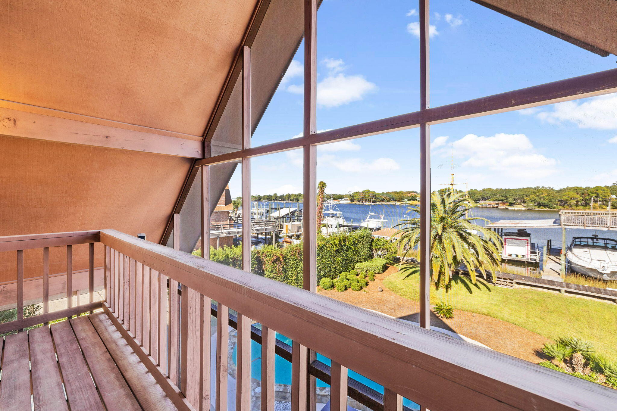 710 Beach Drive Destin, FL 32541 - Photo 32 of 64 a view of a balcony with lake view and a ocean view