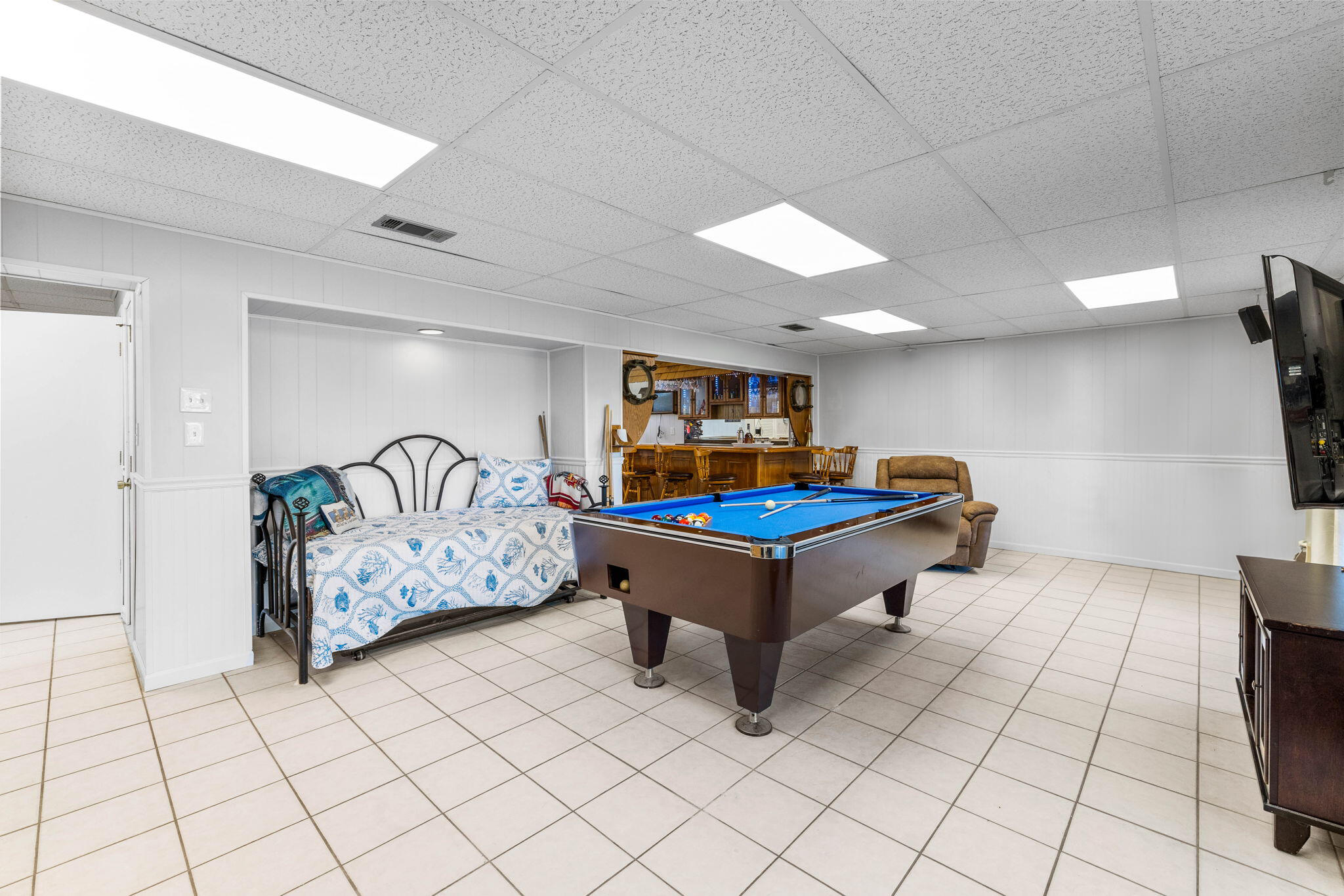 710 Beach Drive Destin, FL 32541 - Photo 44 of 64 a living room with furniture and a table