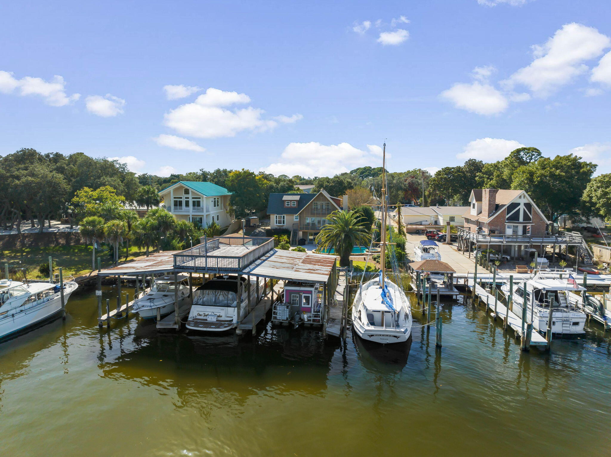 710 Beach Drive Destin, FL 32541 - Photo 56 of 64 a view of a lake with a car parked