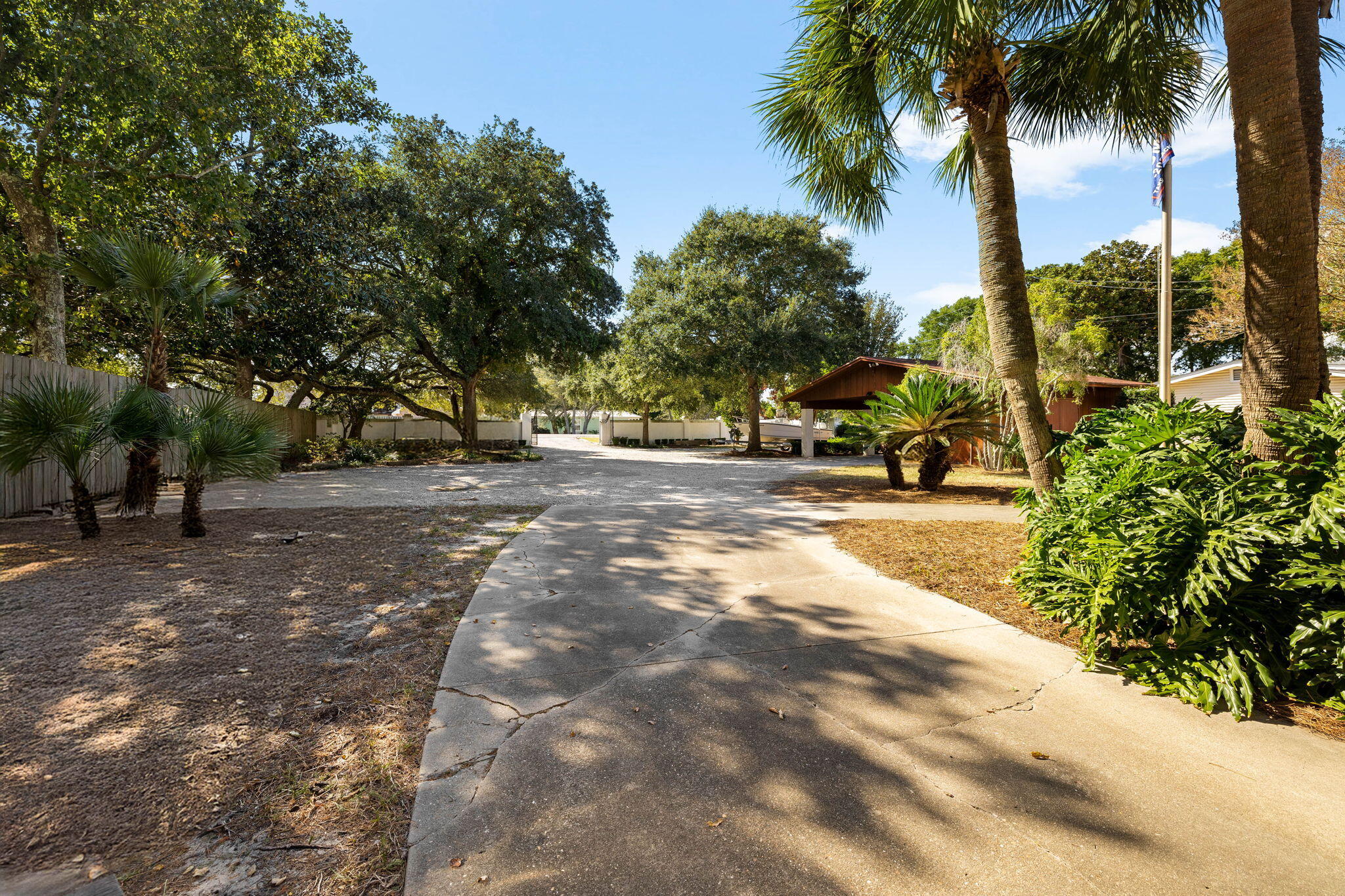 710 Beach Drive Destin, FL 32541 - Photo 57 of 64 a view of a street with palm trees
