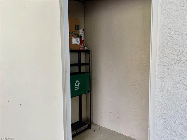 a view of a lake with houses in the back