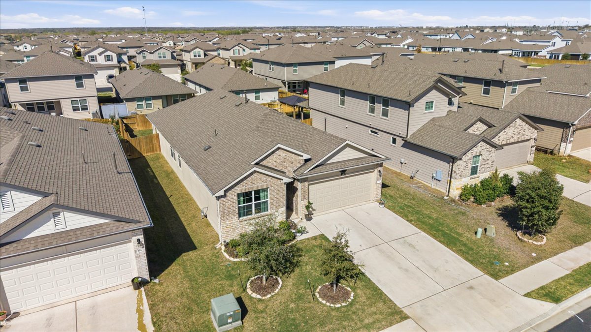 112 Rainmaker Cove Bastrop, TX 78602 - Photo 4 of 34 Aerial perspective of suburban area