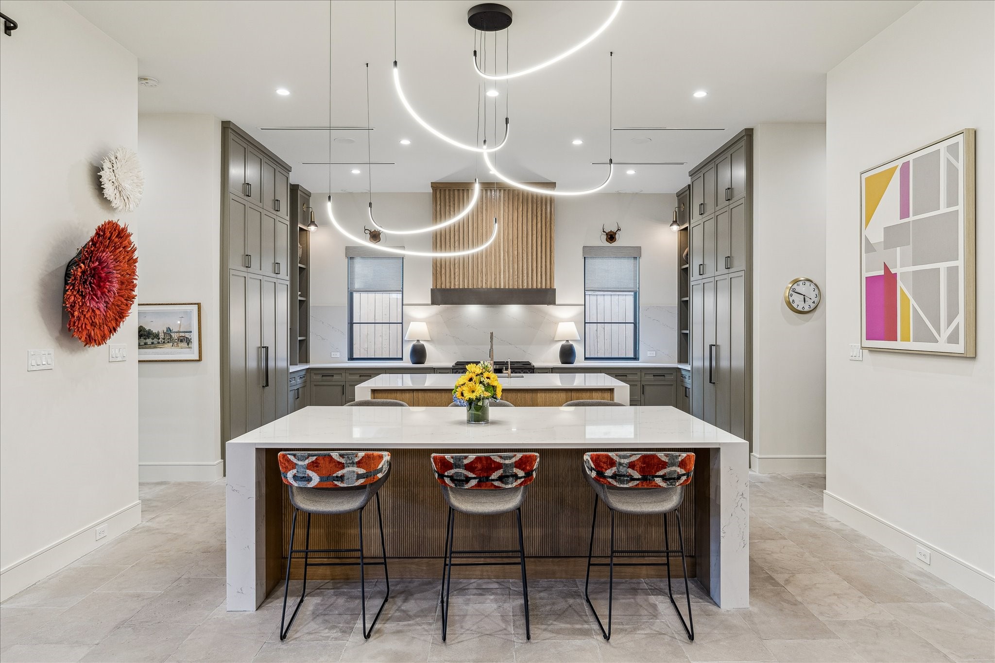 3807 Westerman Street Houston, TX 77005 - Photo 13 of 50 The kitchen features double islands and Dacor appliances, offering abundant cabinetry and a cohesive, thoughtfully designed layout. Sleek lines and functional design make it both a stunning and practical centerpiece for the home.
