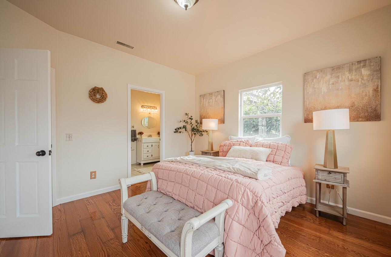 332 Capitol Street Salinas, CA 93901 - Photo 24 of 41 a bedroom with a bed and a table