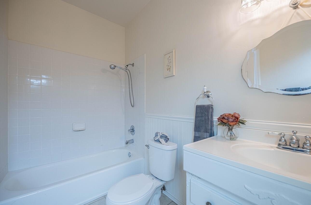 332 Capitol Street Salinas, CA 93901 - Photo 26 of 41 a bathroom with a sink a toilet and shower