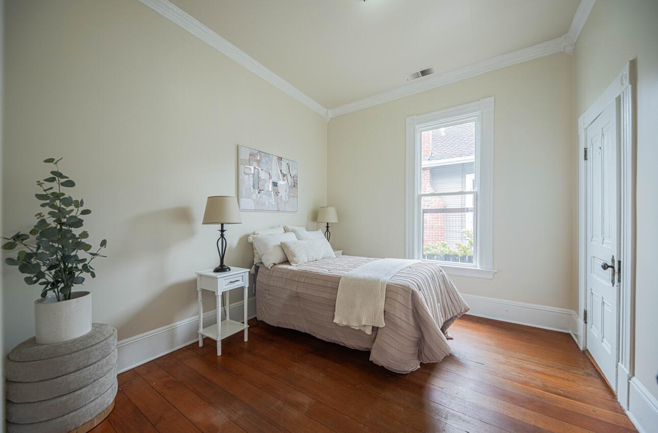 332 Capitol Street Salinas, CA 93901 - Photo 32 of 41 a bedroom with a bed and a potted plant