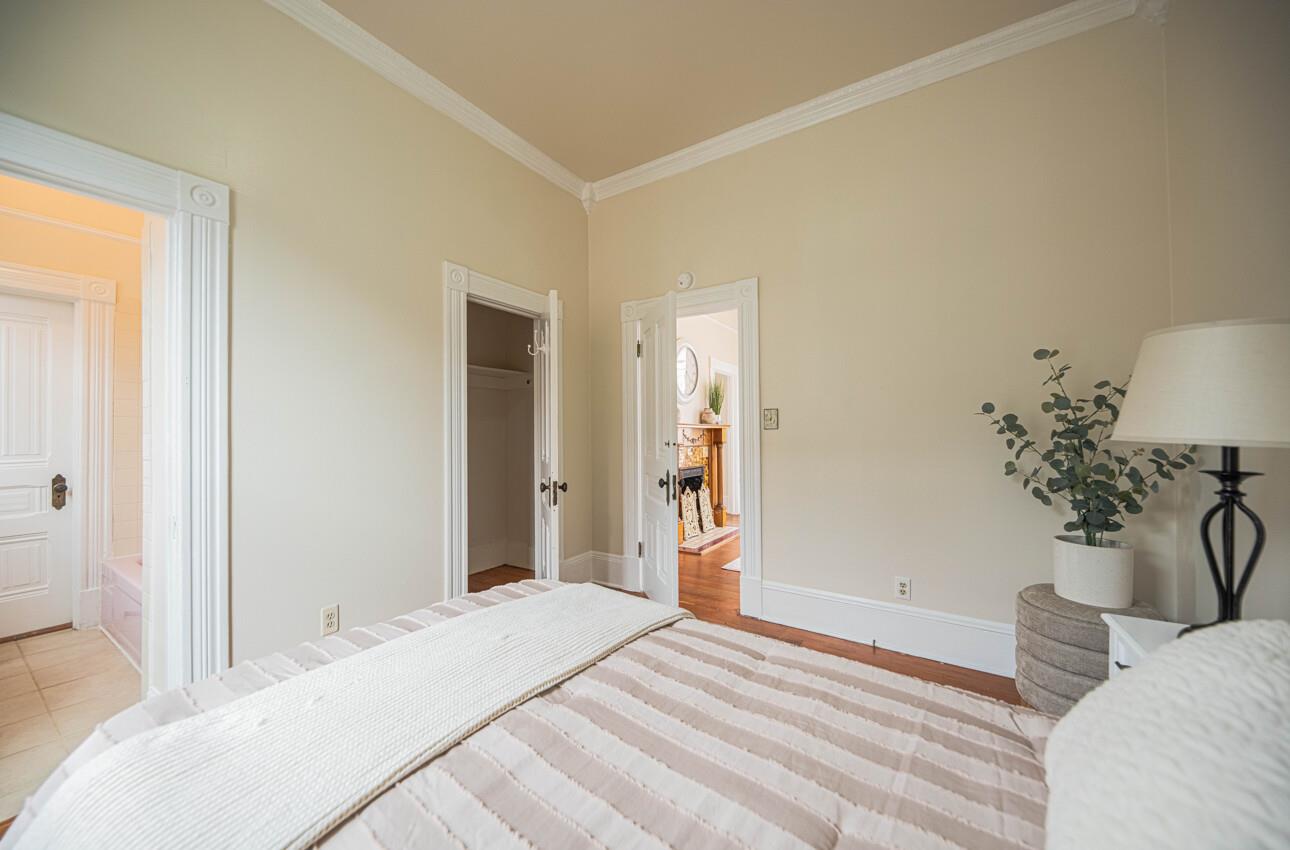 332 Capitol Street Salinas, CA 93901 - Photo 33 of 41 a bedroom with a bed and a potted plant