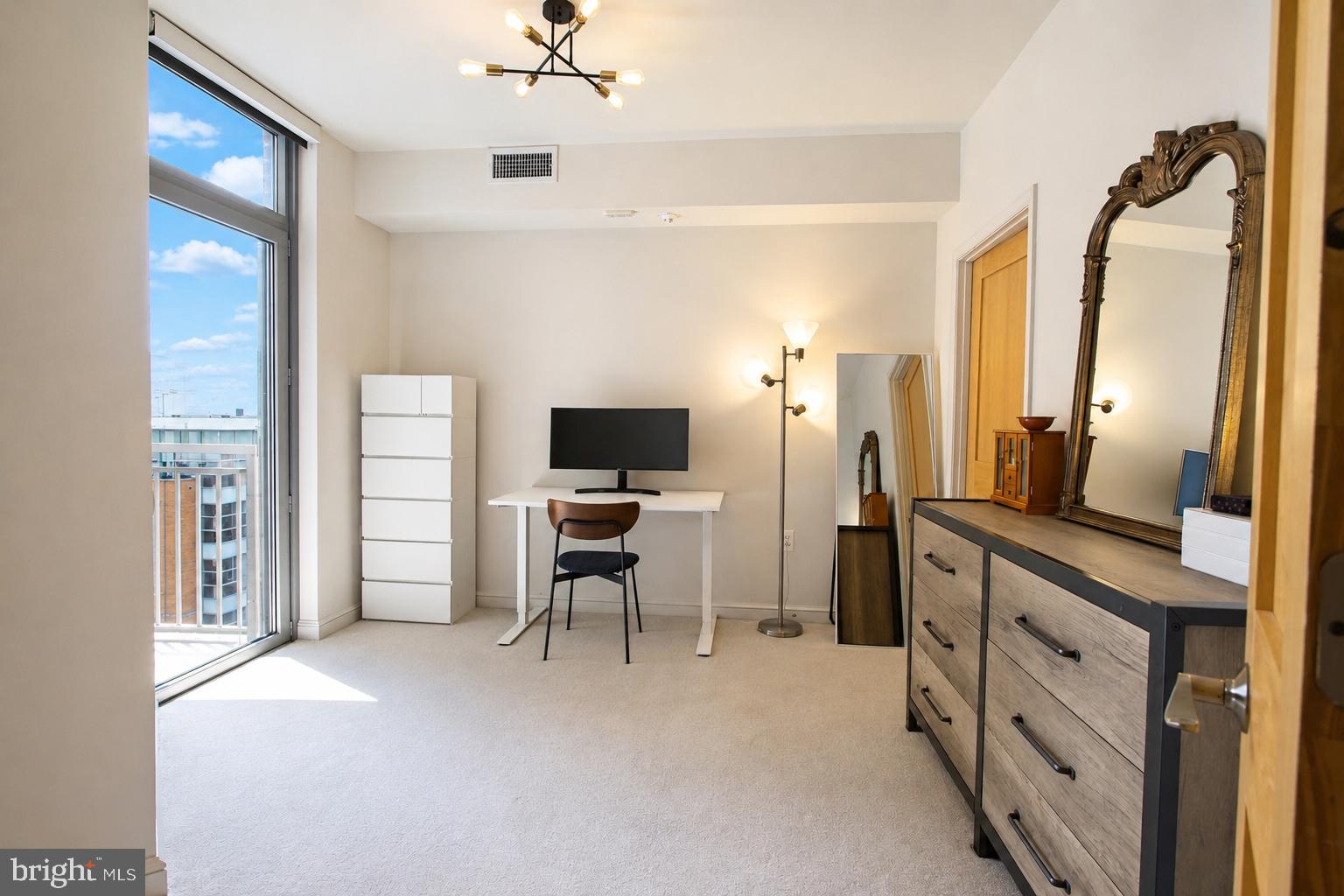 11990 Market Street, Unit 1403 Reston, VA 20190 - Photo 26 of 58 Bedroom 2 with door to private outdoor balcony