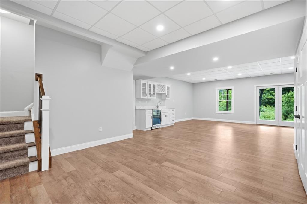 494 Ross Road Eighty Four, PA 15330 - Photo 36 of 50 Finished lower level game room area w/LVP flooring