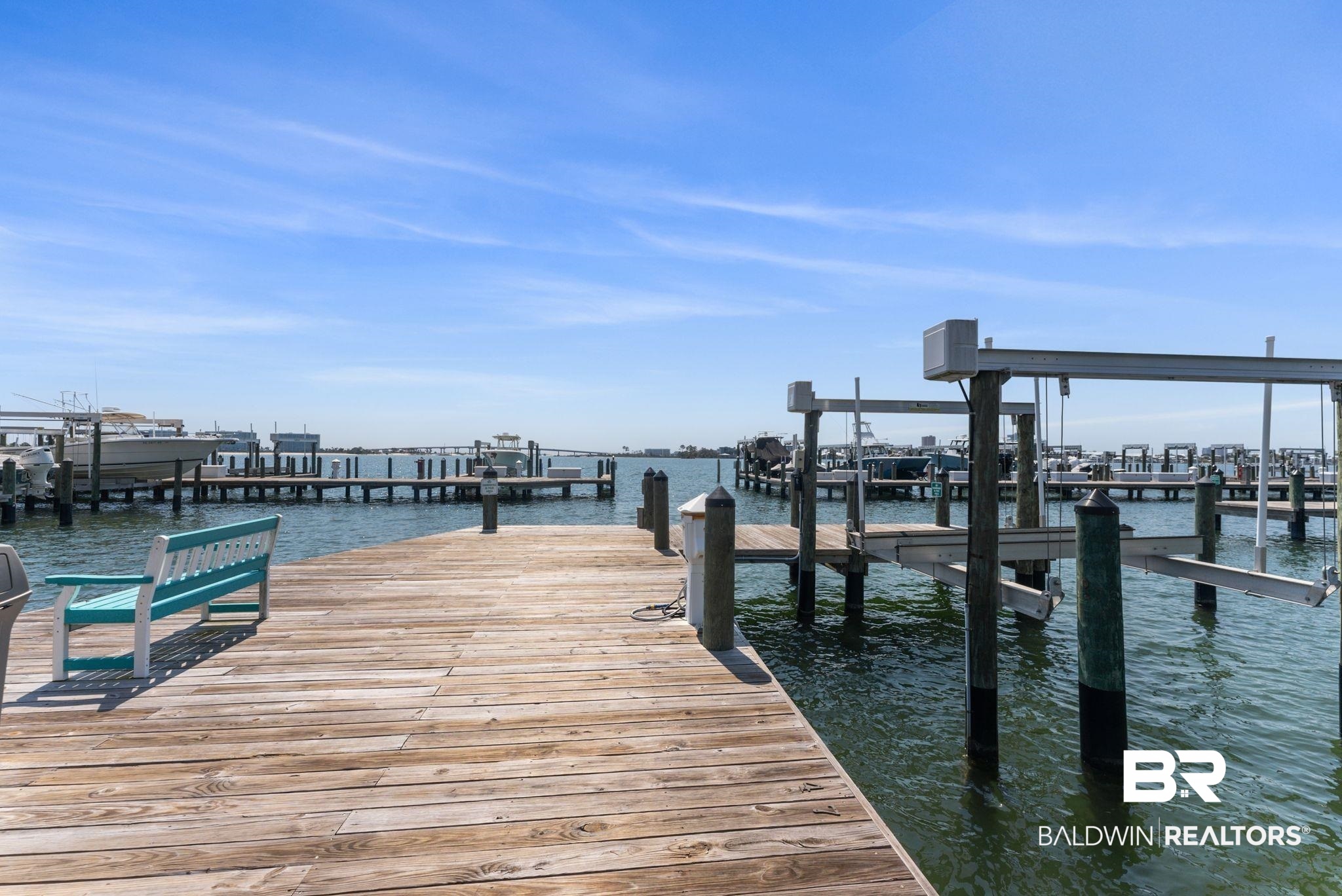 27580 Canal Road, Unit 1233 Orange Beach, AL 36561 - Photo 55 of 79 Dock area featuring a water view and boat lift