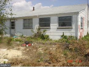 112 East Mullica Road Tuckerton, NJ 08087 - Photo 5 of 6 a front view of house with small garden