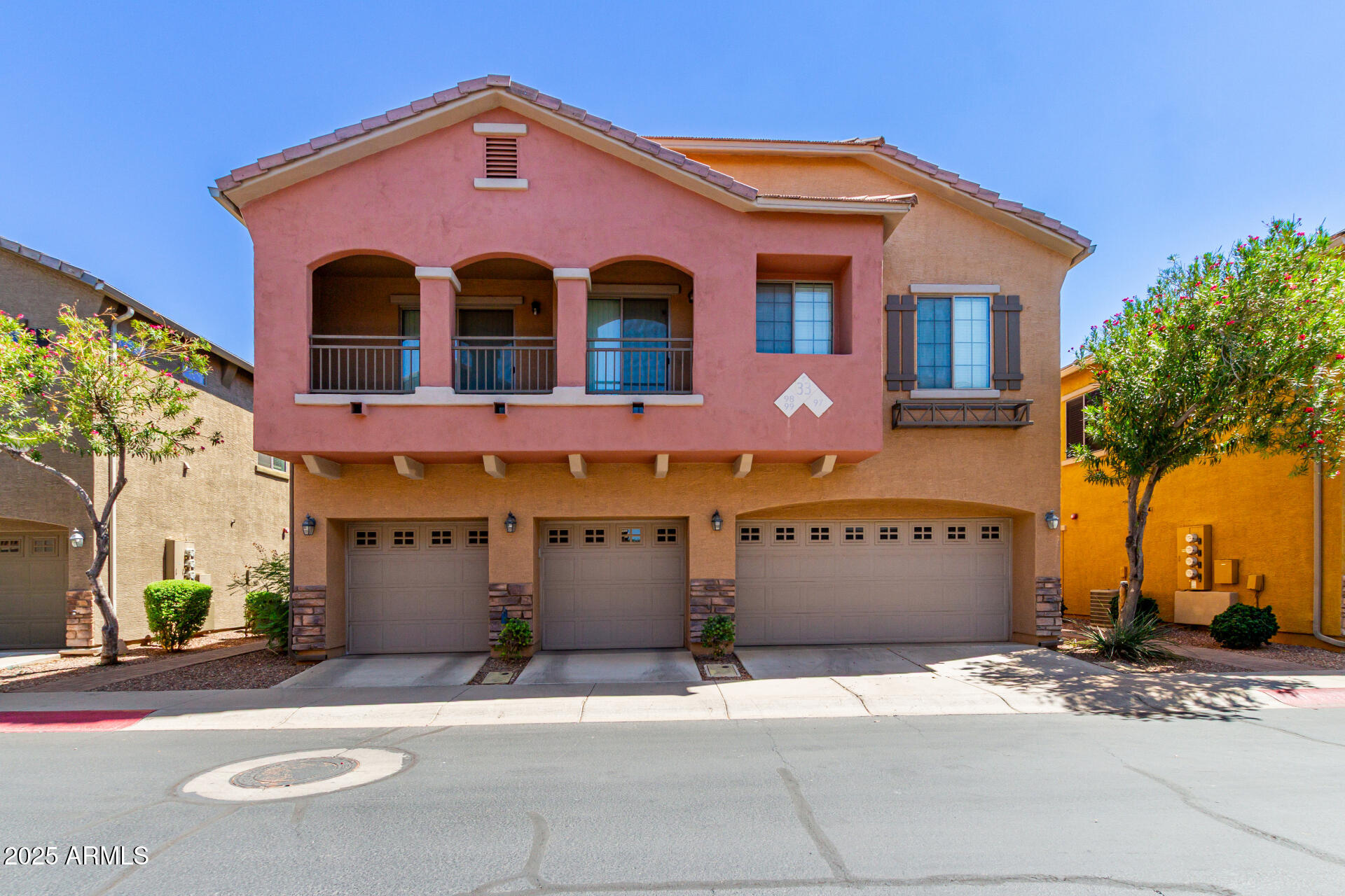 2024 South Baldwin, Unit 99 Mesa, AZ 85209 - Photo 2 of 78 a front view of a house with a yard