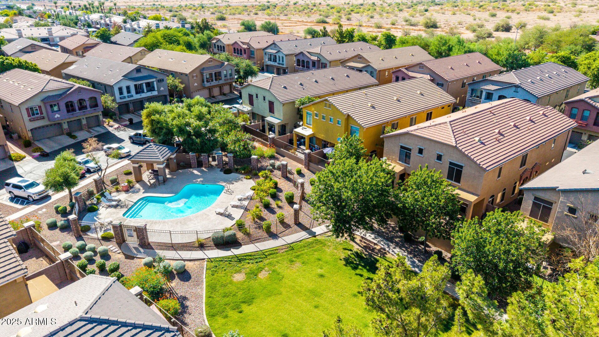 2024 South Baldwin, Unit 99 Mesa, AZ 85209 - Photo 36 of 78 an aerial view of residential house with outdoor space and trees all around