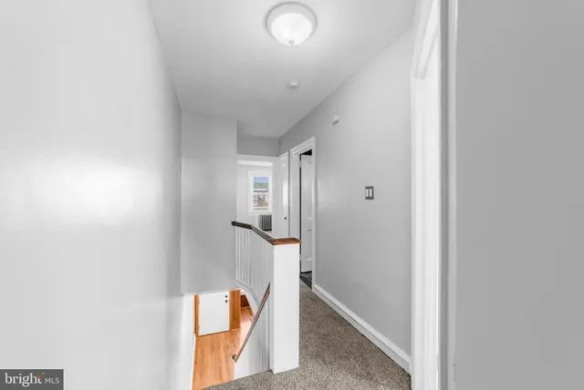 a view of hallway with stairs