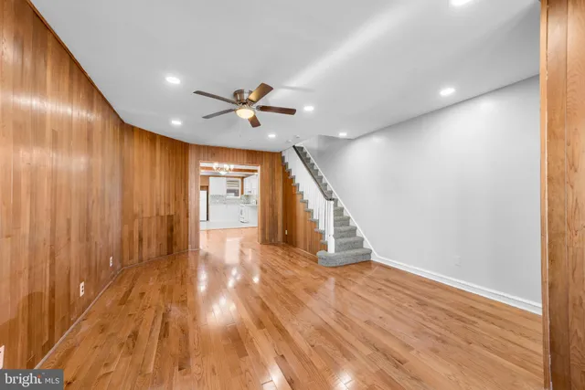 a view of an entryway with wooden floor