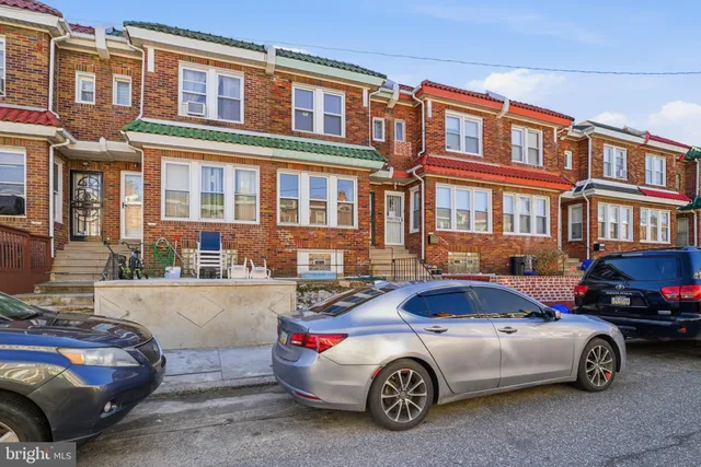 a car parked in front of a building